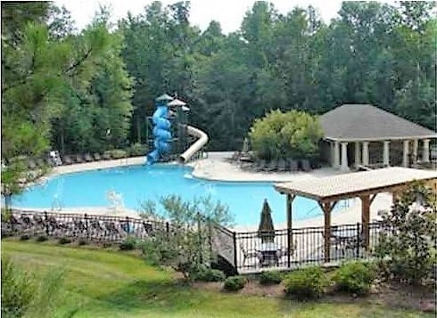 Building Photo - Located in Highland Creek