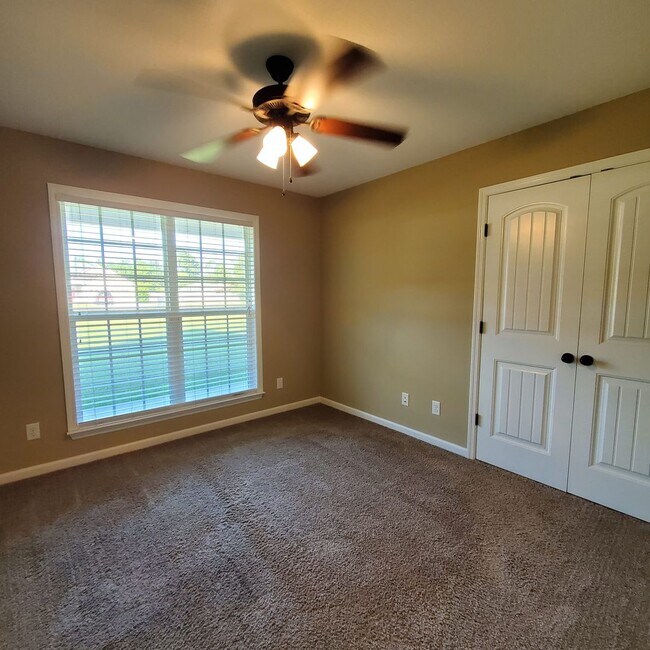 Building Photo - Welcome to Serene Living: Spacious Home on a .61 Acre Lot near Moody Airforce Base