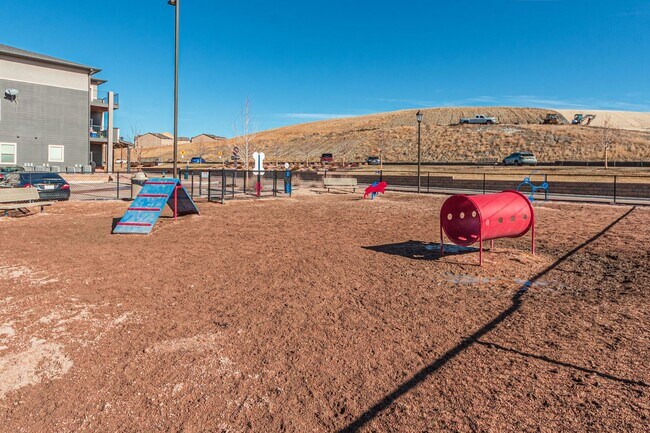 Building Photo - Cozy Fully Furnished  COS Townhome