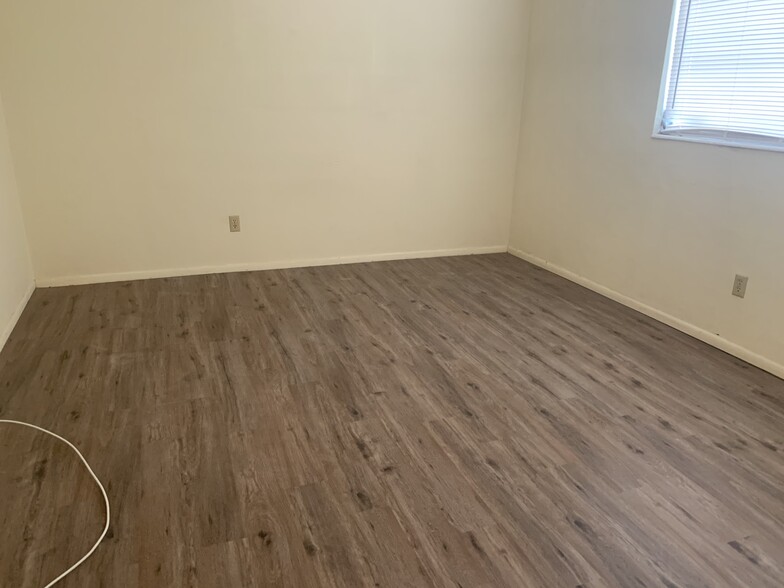 Part of the bedroom with new flooring - 6266 1st Ave S