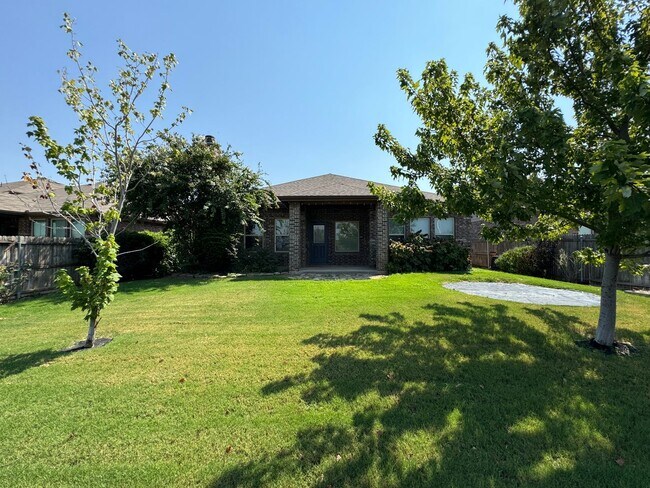Building Photo - Argyle ISD Gem with Huge Private Backyard & Open Floorplan