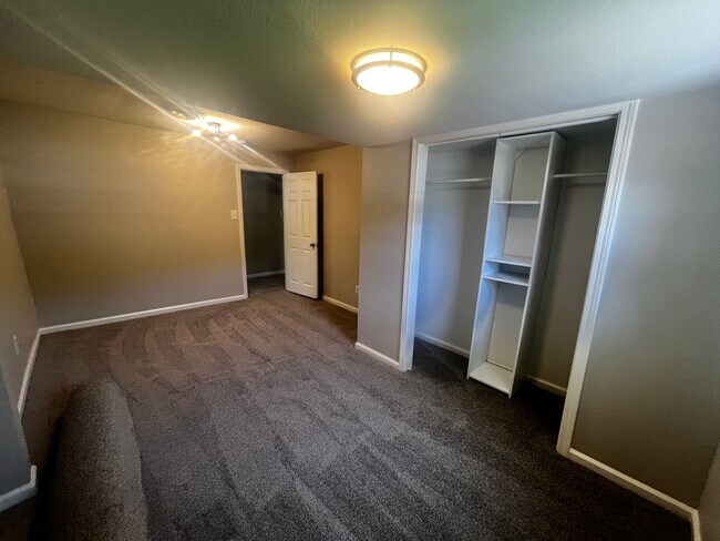 Building Photo - Freshly updated home with privacy fence in...