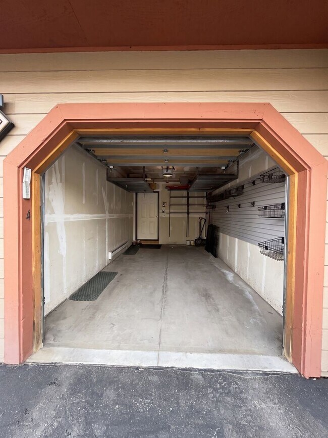 Building Photo - Two-Bedroom Condo with Attached Garage, Available Now