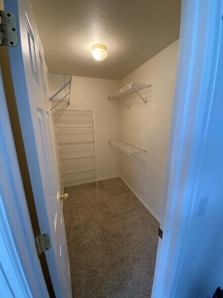 Master bedroom 1 walk-in closet. Similar size for both rooms. - 9056 Gale Blvd