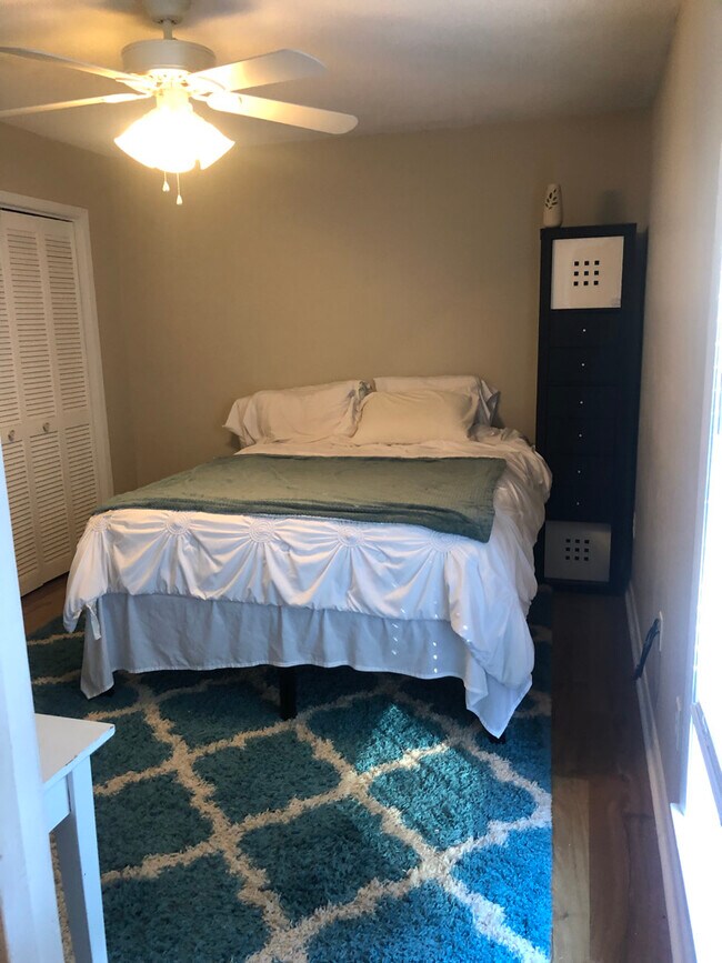 Master bedroom-(end of hall, right side) all furniture pictured included - 130 Richard Dr
