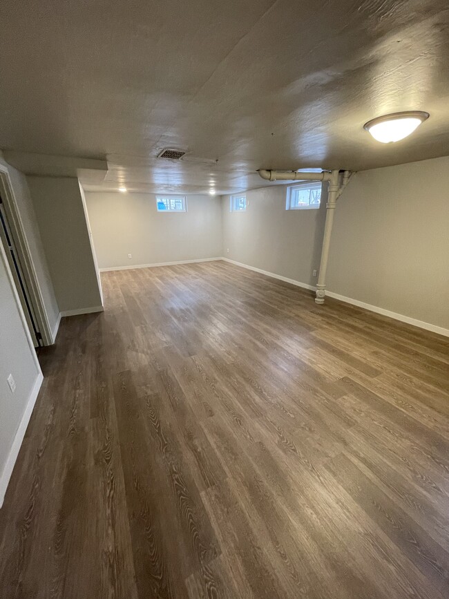 Completely remodeled basement. - 1831 Smith St