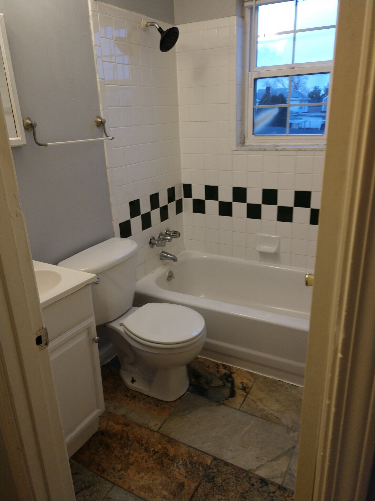 Ceramic tile floor. - 231 Thompson Ave