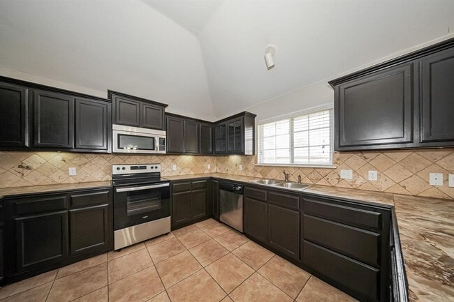 Building Photo - 9423 Peachtree Ln