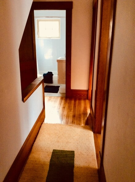 Second floor hallway looking toward the bathroom at the head of the stairs - 240 Fairview Street