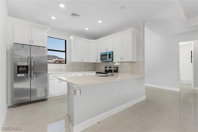 Building Photo - 2435 Tropicana Parkway W