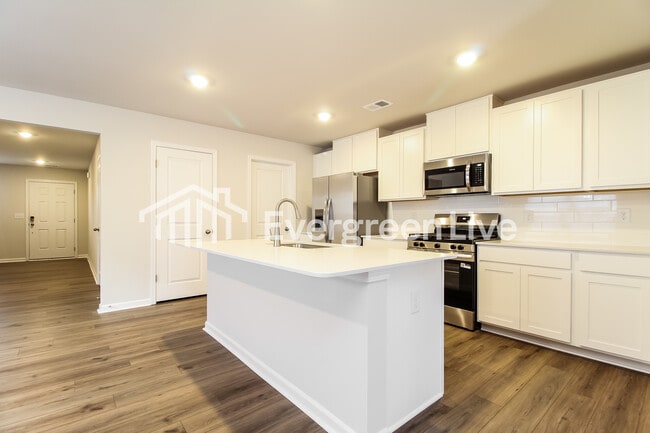 Building Photo - now