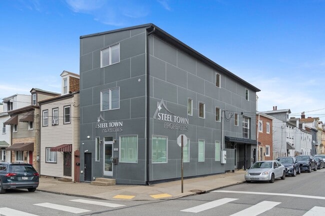 Building Photo - MASSIVE MODERN RENOVATION WITH OPEN LAYOUT...
