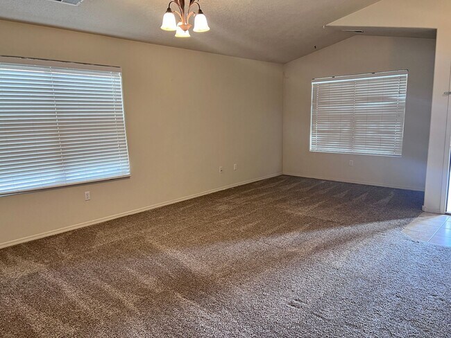 Building Photo - Refrigerated air! 4Br, 2Ba w/2 living areas, 3 CG