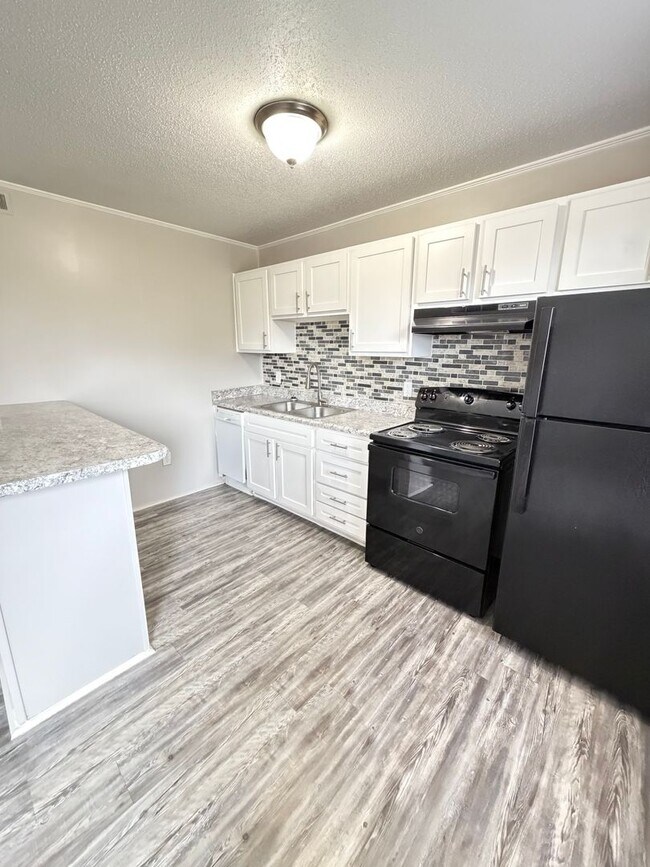 Building Photo - May Savings Are Here! Application Fee WAIVED ALL month!