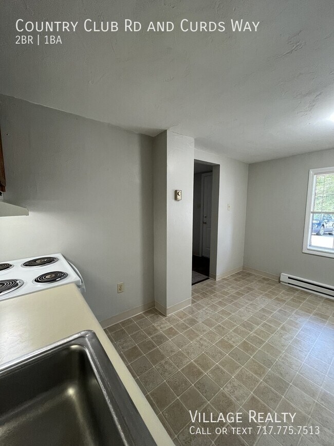 Building Photo - 671 Country Club Rd