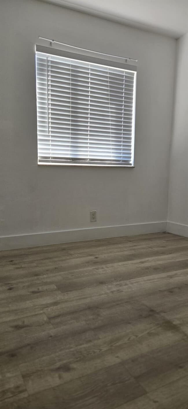 Building Photo - 10930 Royal Palm Blvd