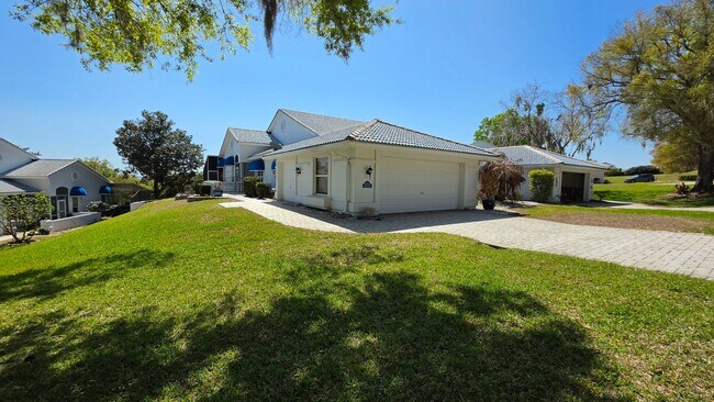 Building Photo - Golf Course Living in a Gated Harbor Hills Country Club – Lady Lake, FL