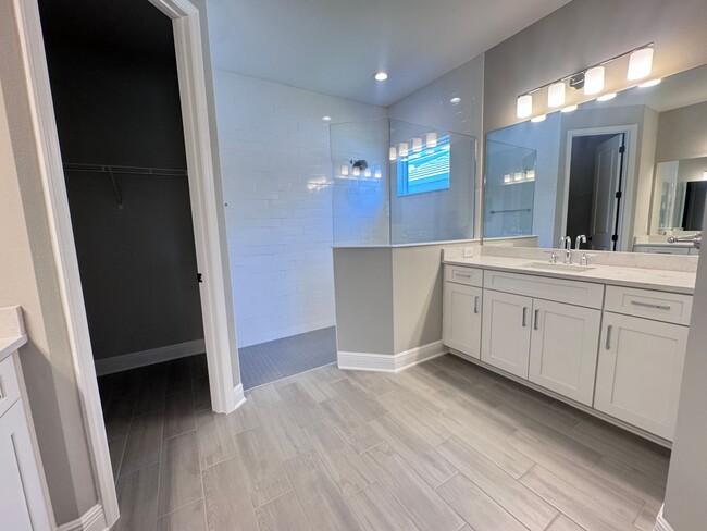 Building Photo - New Construction in Grand Park-4 Bedrooms and 4 Bathrooms with a Den and a Loft! No deposit for q...