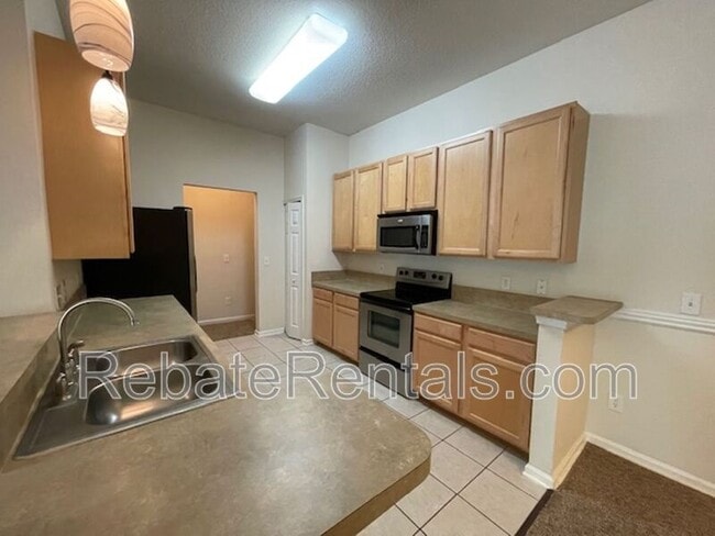 Building Photo - 7064 Deer Lodge Cir