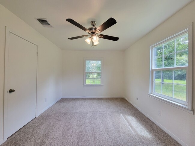 Building Photo - REMODELED 4 BEDROOM 2 BATH LEASE HOME IN A...
