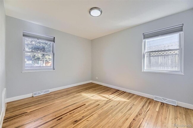 Building Photo - "Charming 3-Bed SFH Denver Gem with Gleaming Hardwood Floors"