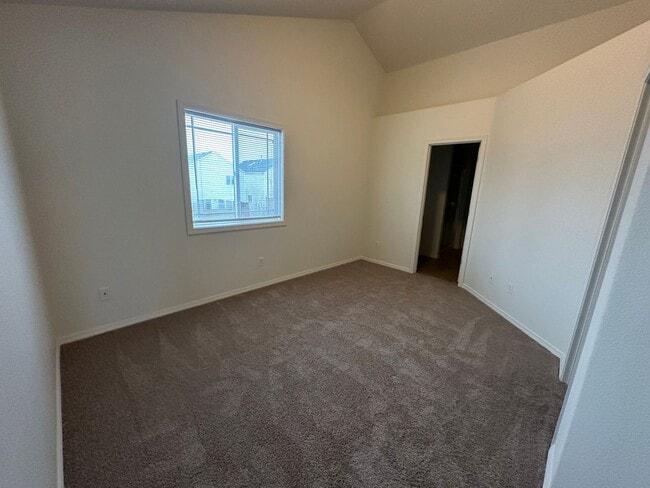 Building Photo - MOVE IN SPECIAL! Spacious 2 bed/2.5 bath with bonus room townhome off Road 68