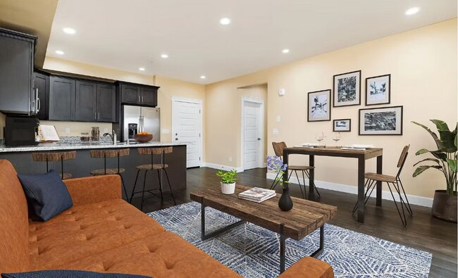 Building Photo - Sophisticated One-Bedroom Living at Marigold Apartments — Available Now