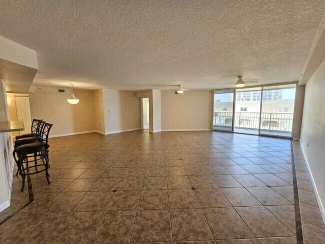 Building Photo - Seaside Serenity Awaits: Spacious 3-Bedroo...