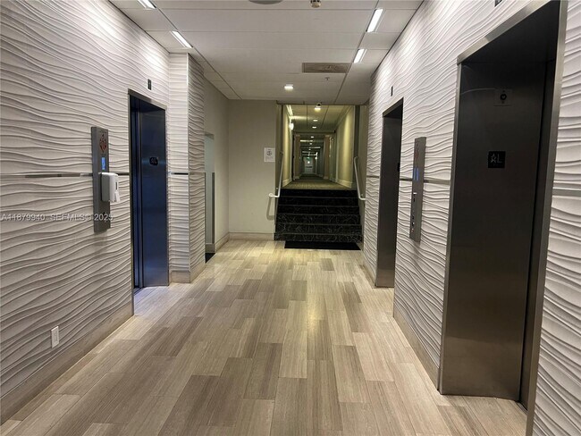 Building Photo - 19390 Collins Ave