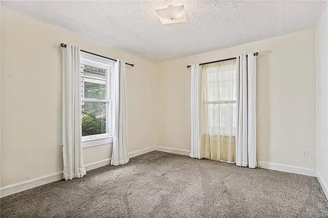 Building Photo - Spacious 3 Bed, 2 Bath Home with 1-Car Garage Near Downtown Kansas City