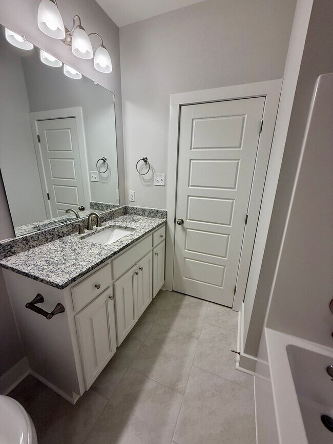 Building Photo - Must See! New 4/2 Home off Tiger Bend Rd. in Garden Hill Subdivision