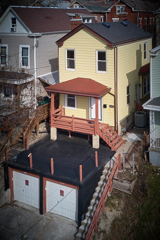 Covered front porch and giant front patio over the two car garage - 2354 Victor St