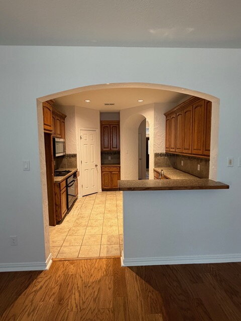 Building Photo - Former model home on corner lot is ready for move in!