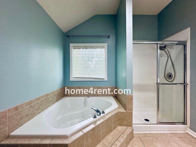 Building Photo - Blue Valley Schools w/ Wood Floors, Finished Basement and a Peaceful, Private Fenced Yard!