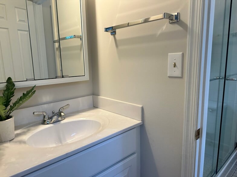 en suite bath with shower - 4847 Chevy Chase Dr