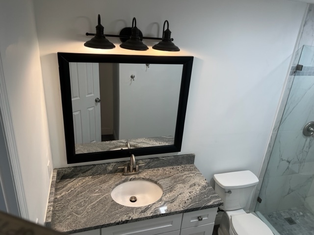 New bathroom vanity and mirror - 4896 SE Horizon Ave