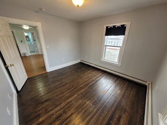 Building Photo - $2350 - 3 Bed / 1 Bath Condominium in Manchester's Somerville Neighborhood with 2 Car Off-Street ...