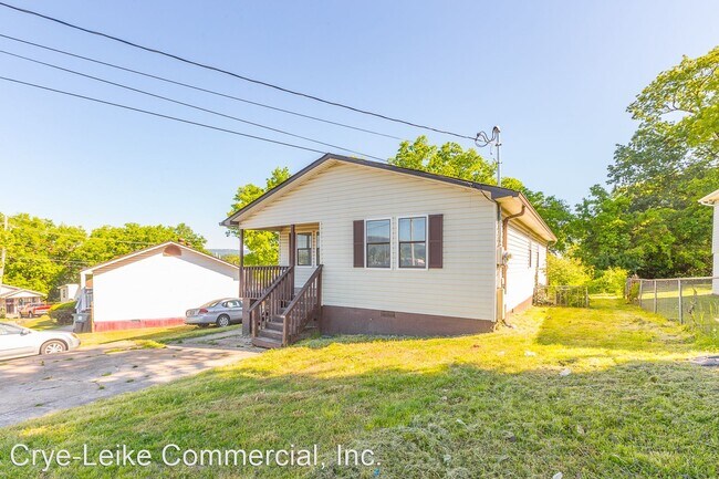 Building Photo - 4 br, 1.5 bath House - 1403 East 5th St.