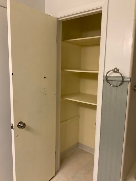 Linen closet in bathroom - 419 Peachtree Cir