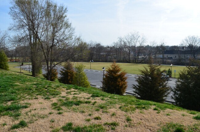 Building Photo - Charming Townhome in Prime Broadway Location – Steps from Parks & Outdoor Amenities!
