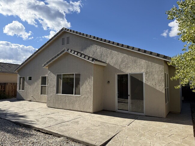 Building Photo - South Reno Home with 4 Bedrooms + 3 Car Garage!