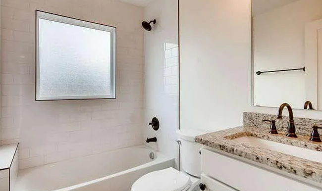 Building Photo - Three bedroom, 2 bathroom modern property!...