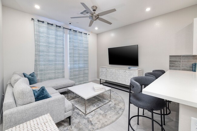 Building Photo - FULLY FURNISHED BRAND NEW TOWNHOME WITH 3 BEDROOMS + 2 CAR GARAGE