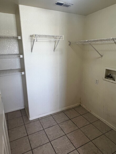 W/D hookups and shelved storage - 593 S Aguilar Dr