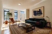 Building Photo - Charming 2 Bed 1.5 Bath Upper Duplex in Bushwick with Garden
