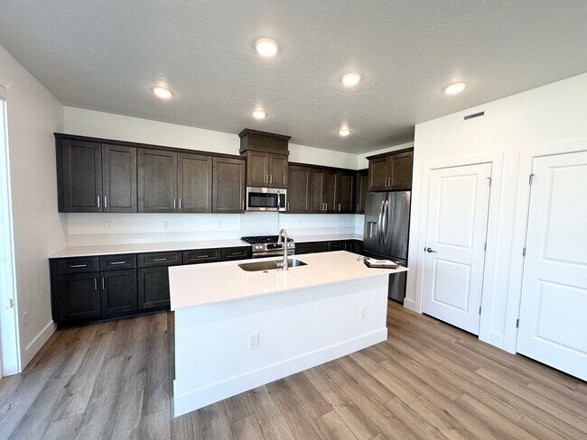 Building Photo - Spacious Luxury Townhome Designed for Modern Living available soon!