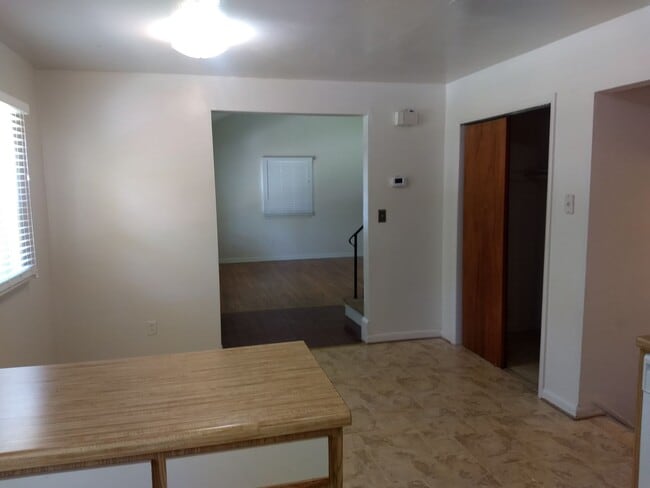 Building Photo - TRI-LEVEL HOME WITH GARAGE AND LARGE FENCE...