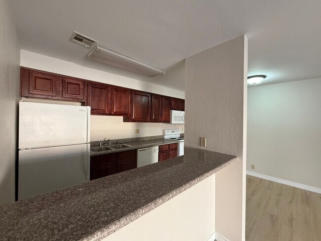 Building Photo - Upstairs unit at Bella Vita Guard-Gated Co...