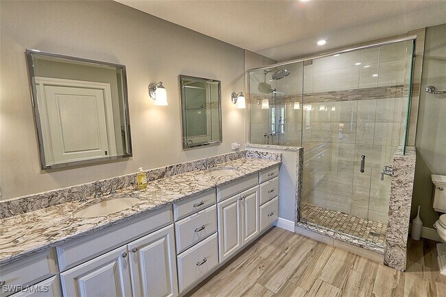 Building Photo - 6131 Pelican Bay Blvd