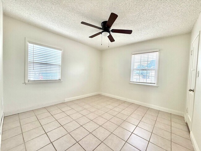 Building Photo - Spacious Three-Bedroom Two-Bathroom Home with large yard $3,095